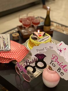 a table topped with lots of different types of cakes