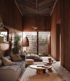 a living room filled with furniture and lots of wood paneling on the walls next to a window