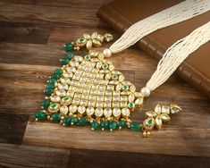 This is a stunning handmade necklace perfect for high end Jewelry Collector, a keeper in Traditional Vintage Indian/Pakistani Bridal jewelry and a Luxury Gift for your Daughter, Sister or Wife on Wedding or Anniversary. Perfect for any type of occasions, weddings And celebrations and a beautiful & memorable gift for weddings and special occasions. Description  Item Code:- L9677 Meenakari Kundan Necklace Set w/ Earrings  Necklace Measures- 11" Long Adjustable with a Dori/Cord Earring Measures- 60x20mm approx Quantity- One Necklace Set Please see more different designs here:- https://www.etsy.com/in-en/shop/LUCKYJEWELSART?ref=seller-platform-mcnav I make every item of my collection with a lot of love and care, I pay attention to every detail.  You are more than welcome to contact me for any Polki Diamond Necklace, White Beaded Necklace, Pakistani Bridal Jewelry, White Beaded Necklaces, Earrings Trendy, Diamond Necklace Set, Kundan Necklace, Kundan Necklaces, Necklace White