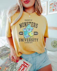 Monster University T-Shirt, Monster Inc Expression Halloween Shirt, Monster University Shirt, Monsters Costume Party Group Matching We design trendy sweatshirts that you can use in every important day of your life. We produce beautiful and quality designs that can be used in all kinds of activities that you will do with your family or friends. These designs will offer you and your environment a unique complement. We are very excited to bring you our high quality and soft, trendy sweatshirt. Ever Casual Yellow Top For Halloween, Graphic Tee With Crew Neck For Fan Conventions, Halloween Crew Neck Tops For Fan Conventions, Halloween Fandom Graphic T-shirt, Halloween Fandom T-shirt With Graphic Print, Fandom Crew Neck Shirt With Screen Print, Pop Culture Crew Neck Top With Letter Print, Crew Neck Tops For Halloween And Fan Conventions, Crew Neck Tops For Halloween Fan Conventions