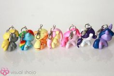 a row of small plastic keychains in different colors