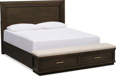 a bed with two drawers underneath it and a white blanket on top of the bed