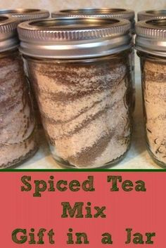 spiced tea mix in a jar with text overlay reading spiced tea mix gift in a jar