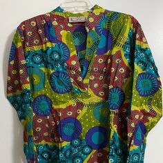 100 % Cotton Tunic Blouse,Never Worn But Tags Gone. Washable. Colorful Tunic Style. Casual Multicolor V-neck Tunic, Green V-neck Top With Vibrant Print, Multicolor Long Sleeve Relaxed Fit Blouse, Relaxed Fit Multicolor Cotton Blouse, Multicolor Relaxed Fit Cotton Blouse, Multicolor Print Long Sleeve Tops For Vacation, Green Long Sleeve Tops With Colorful Pattern, Multicolor V-neck Shirt For Beach, Summer Multicolor Split Neck Tops