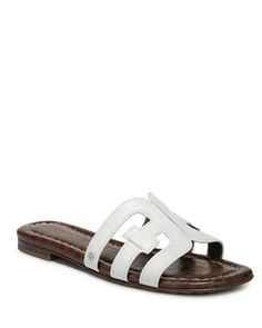 Sam Edelman Women's Bay Slide Sandals Classic Tan Sandals For Spring, Classic Tan Sandals For Summer, Tan Leather Open Toe Slides, Tan Leather Slip-on Sandals, Summer Tan Leather Slides, Leather Slides In Tan For Summer, Designer White Sandals With Leather Footbed, Adjustable Tan Leather Sandals, Tan Sandals With Leather Footbed For Summer