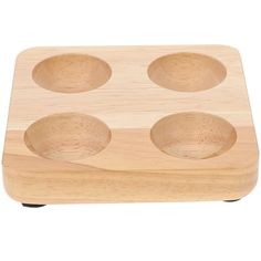 three wooden bowls sitting on top of each other