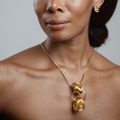 African American Model Wearing Helen Necklace - 14k Gold Plated - Iza By Silvia D’Avila one of a kind, off the runway jewelry & wearable art - handcrafted in NYC Modern Yellow Gold Jewelry, Modern Yellow Gold Jewelry With Unique Design, Modern Metal Jewelry With Polished Finish, Modern Plated Metal Jewelry, Modern Polished Metal Jewelry, Modern Metal Plated Jewelry, Contemporary Polished Jewelry For Formal Occasions, Contemporary Formal Jewelry With Polished Finish, Modern Round Jewelry With Unique Variations