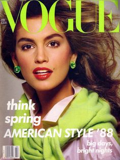 a magazine cover with an image of a woman wearing green scarf and earrings on her head