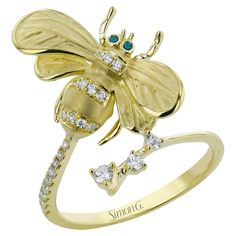 18K yellow gold queen bee wrap around ring by Simon G. The ring is made of 18K yellow gold and furnished with 24 round diamonds 0.22 carat and 2 round emeralds 0.02 carat. - Finger size - Diamonds are G color, VS clarity. Simon G Jewelry, Wrap Around Ring, Bees Wrap, Bee Ring, Bee Jewelry, Gold Bee, Wrap Ring, Queen Bee, Wrap Rings