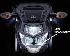 the headlight on a motorcycle is shown with an arrow pointing to it's headlights