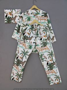 Jungle Printed Pajamas, Bridesmaid Pajamas Short Set, Bridesmaid Pajama Pants, 100% Cotton Soft & Comfortable Comfy Night Wear Pajama Item :- Hand Block Printed Pajama Set This pajama is made for a relaxed fit and allows for ease of movement throughout the night. Every piece can be made customized to your desires. Neck line - ( V - Neck ) Open Button Sleeve length - ( 3/4 Sleeve ) Closure - ( Front 3 Button Open ) Type : Sleepwear Gender : Women's Size Type : Regular Material : 100% COTTON FABRIC Garment Care : Hand Wash Comes in S/M/L/XL/2XL/3XL/4XL/5XL sizes, but without any complications can be adjusted to individual measurements. In this same product we are able to making customization like Color :- Base Color Is  Multicolored Floral Prints Have been Crafted. Usage :- Sleepwear, Nightw Night Wear Pajamas, Cotton Night Suit, Bridesmaid Pajama, Bridesmaid Pajamas, Pajamas Short, Printed Pajama, Pyjamas Set, Bridesmaid Pyjamas, Cotton Pajamas