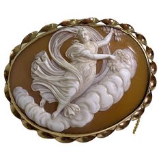 An Antique Victorian Finely Carved Shell Cameo Brooch with a bail - provision to wear a piece as a pendant within a 9K Yellow Gold decorative rope border featuring safety chain beautifully detailed, depicting Goddess wearing dress Brooch measures 52mm x 42mm, weighing 11.2gr. Victorian, circa 1870’s In excellent condition Mythology Jewelry, Cameo Jewelry, Victorian Gold, Carved Shell, Cameo Brooch, Pin Pendant, Cameo Pendant, Gold Brooches, Unique Antiques