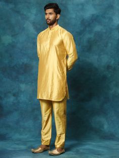 VASTRAMAY Men's Mustard Viscose Kurta Pyjama Set A classic choice for any festive occasion, the VASTRAMAY Men's Mustard Viscose Kurta Pyjama Set exudes elegance and style. Crafted with high-quality viscose fabric, it offers utmost comfort and a perfect fit. Whether it's a wedding ceremony or a cultural festival, this kurta pyjama set is sure to make you stand out. Features: Classic mustard color Soft and breathable viscose fabric Elegant design with intricate detailing Comfortable pyjama with dr Classic Long Sleeve Festive Traditional Wear, Classic Eid Festive Sets, Classic Festive Sets For Eid, Classic Traditional Wear For Eid Festive, Classic Gold Sets For Festive Season, Classic Gold Festive Sets, Classic Gold Festive Set, Classic Gold Long Sleeve Sets, Classic Long Sleeve Sets For Eid