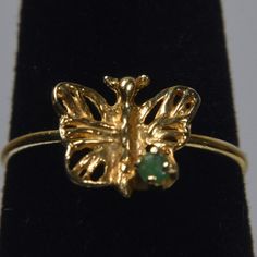 Cute Little 14k Yellow Gold Ring In The Shape Of A Butterfly Set With A Tiny Green Emerald. Size 2 3/4 .76g Gold 14k Butterfly Ring, Adjustable Butterfly Shaped Yellow Gold Jewelry, Emerald Butterfly Ring, 14k Gold Butterfly-shaped Rings As Gift, Hypoallergenic Butterfly-shaped Yellow Gold Jewelry, Gold Butterfly Ring, Butterfly Ring, Gold Butterfly, Size 2