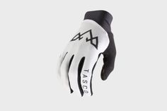 a white and black glove with the words las vegas written on it's palm