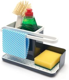 a soap brush, sponge and toothbrush holder