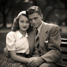 a man and woman are sitting on a bench