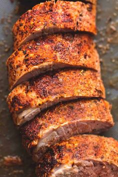 sliced pork loin sitting on top of a pan