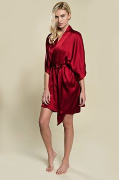 Incredibly soft and luxurious, our signature Samantha silk robe has a beautiful drape that is elegant and oh-so-flattering. Wrap your body in luxurious 100% pure silk that looks just as amazing as it feels!A timeless getting ready robe for your big day, and perfect honeymoon lounge wear for the days to come. Style with lingerie or your favorite silk slip for a glamorous look that can be worn long after the wedding.Designed with wide kimono sleeves, fully lined cuffs and neck band (no visible sti Red Robe Silk, Getting Ready Bridesmaids, Red Silk Robe, Lingerie Bridal Shower, Bridesmaids Getting Ready, Silk Bridal Robe, Satin Bridal Robe, Perfect Honeymoon, Dark Garnet