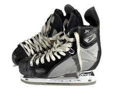 a pair of ice skates sitting on top of each other