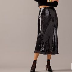 We Collaborated With The Ukrainian Designer On An Effortlessly Sexy, Party-Ready Capsule For The Holiday Season. This Statement Skirt Comes With Lots Of Light-Reflecting Sequins All Over And A Slip Lining For Comfort. 100% Polyester. Side Zip. Lined. Dry Clean. Elegant Skirt For Party Season, Elegant Party Season Skirt, Glamorous Formal Pencil Skirt, Holiday Night Out Pencil Skirt, Chic Lined Skirt For Holiday, Chic Pencil Skirt Bottoms For Party Season, Chic Lined Skirt For Parties, Fitted Holiday Pencil Skirt, Holiday Fitted Pencil Skirt