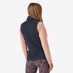 This warm, 100% recycled polyester full-zip vest combines a sweater-knit aesthetic with the easy care of Better Sweater fleece. It’s dyed with a low-impact process that reduces the use of dyestuffs, energy and water compared to conventional heather dyeing methods. Made in a Fair Trade Certified™ factory. Slim fit What customers are saying: True To Size 100% Recycled Polyester Fleece Made from warm, soft, long-lasting 100% recycled polyester fleece with a sweater-knit face, a fleece interior and heathered yarns; dyed with a low-impact process that reduces the use of dyestuffs, energy and water compared to conventional heather dyeing methods Full-Zip Vest with Stand-Up Collar Full-length zipper with a zip-through stand-up collar and a kissing-welt zipper garage Comfortable Trim Soft brushed- Knit Aesthetic, Fleece Vest Women, Loading Icon, 50% Logo, Patagonia Sweater, Patagonia Women, Tricot Fabric, Better Sweater, Fleece Vest