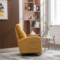 a yellow recliner chair sitting in front of a book shelf