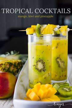 tropical cocktails mango, kiwi and pineapple on a white plate with fruit