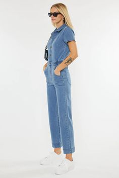 Turn heads everywhere you go in this stylish denim jumpsuit! You are sure to become an instant fashionista with this trendy-chic jumpsuit with a straight-leg fit in a medium wash. Kancan Straight Leg Jumpsuit Elastic Waistband 4 Pocket Design Exposed Button-up Front Rise 11.75" Inseam 26.5" (size M) Color - Medium Wash Blue Denim 77% Cotton 10% Polyester 5% Rayon 6% T-400 2% Spandex Trendy Light Wash Denim Overalls, Trendy Light Wash Denim Overall Jumpsuit, Chic Medium Wash Jumpsuits And Rompers With Pockets, Chic Medium Wash Overall Jumpsuits And Rompers, Trendy Light Wash Overall Jumpsuits, Chic Dark Wash Relaxed Fit Denim Jumpsuit, Chic Dark Wash Denim Jumpsuit With Relaxed Fit, Straight Leg Jumpsuits And Rompers For Workwear In Spring, Chic Light Wash Relaxed Fit Denim Jumpsuit