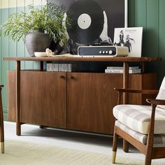 Credenza Description With beautiful unity of structure, function, and materials, the mid-century modern Walnut Grove credenza offers generous, flexible storage. Two center doors open to reveal an adjustable shelf and two drawers. Credenza FeaturesTop material stoneMid Century ModernDue to lighting and monitor differences, actual colors and finishes may vary slightly from what appears onlineProduct SpecificationsStone Top CredenzaBrandStickley FurnitureLength21.000Width67.000Height34.000Weight210 Sideboard Decor Ideas, Home Decor Mood Board, Decor Mood Board, Washington House, Stickley Furniture, Mid Century Modern Office, Mid Century Credenza, Sideboard Decor, Wooden Sofa Designs