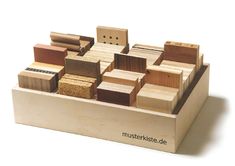 a wooden block with different types of wood blocks in it and the words mustetsticks written on them