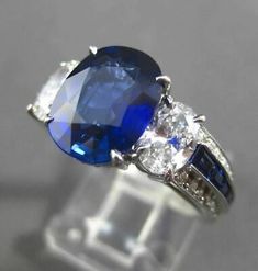 ANTIQUE PLATINUM 4.83CT DIAMOND & AAA SAPPHIRE 3 STONE ENGAGEMENT RING E/F VVS | eBay Exquisite Diamond-cut Sapphire Ring, Exquisite Diamond Cut Sapphire Ring, Luxury Three Stone Round Cut Sapphire Ring, Blue Three Stone Platinum Jewelry, Timeless Three Stone Blue Jewelry, Timeless Three-stone Blue Jewelry, Luxury Three Stone Emerald Cut Sapphire Ring, Formal Three-stone Sapphire Ring Fine Jewelry, Luxury Three-stone Emerald-cut Sapphire Ring