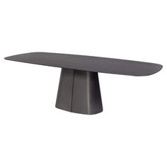 a black table with an oval shape on the top, and a curved metal base