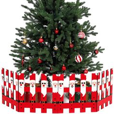 a christmas tree with santa clause decorations on it