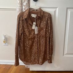 Beautiful Brand New With Tags Bronze Colored Sequin Blouse. Xs. Never Worn. Perfect For Holiday Parties. I Would Say Anthro Tends To Run A Bit Larger In Sizingi Would Normally Be A Small In Other Brands But Xs In Their Clothing Fall Workwear Blouse With Sequins, Fitted Sequin Shirt For Spring, Fitted Sequin Blouse For Workwear, Fitted Tops For Festive Fall Season, Fitted Tops For Festive Fall Occasion, Festive Fitted Tops For Fall, Fitted Tops For Fall Festivities, Fitted Fall Blouse With Sequins, Fitted Sequin Blouse For Fall