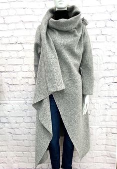 Long Alpaca a Wrap Coat, Grey Wool Kimono Cardigan, Long Felted Cardigan, Multiple Look Wool Wrap, Oversized blanket jacket, Plus Size Coat This Casual Chic, Long, Alpaca Blend Kimono Coat in Silver Grey is just as perfect for a cool summer day, as it is for a comfortable Sunday afternoon stroll in the fall or a cosy house coat in a freezing winter night. Pairs with a pair of jeans, dress pants, leggings, a dress or a skirt, it is a true four season treasure. - MATERIAL: Alpaca Blend  This coat is also available in Merino wool. Please see variations. -SIZE: One size. Fits well Medium to 3XL Please feel free to inquire about larger sizes  - CARE: Dry cleaning is recommended for those who must preserve original size of the garment  If you don't mind 3-5% shrinking, cold temperatures machine Wool Kimono, Boiled Wool Coat, Plus Size Coat, Blanket Jacket, Cosy House, Wool Wrap Coat, House Coat, Kimono Coat, Oversized Blanket