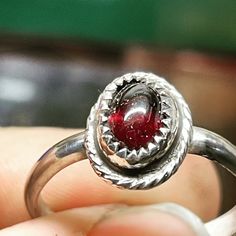 Garnet mined in Ball Ground Georgia by me and polished by me as well then set in a sterling silver ring also made by me. This ring is an 8.5 but can be stretched or I can make a similar ring my request. Shark Tooth Ring, Tooth Ring, Star Garnet, Solitaire Rings, Spoon Rings, Red Band, Ring Photos, Garnet Rings, Jewelry Maker