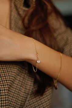 The Cubic Zirconia Figaro Bracelet is more than just a piece of jewelry; it's a symbol of understated elegance and refined taste. Its delicate design makes it perfect for layering with other bracelets or wearing alone as a delicate statement piece. 14k Gold Filled Bracelet Width - 1.5mm Cubic Zirconia - 5mm Extender - 1 inch If you would like a custom length, please don't hesitate to ask. We are more than happy to make one for you. All items come packaged in a gift box ready to give as a gift or Delicate Gold Bracelet, Bracelet Minimal, Figaro Bracelet, Tiny Jewelry, Bracelet Layering, Minimal Bracelet, Designers Jewelry Collection, Dainty Gold Bracelet, Gold Chain Bracelet