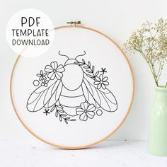 the embroidery pattern is ready to be made into a wall hanging or table top decoration