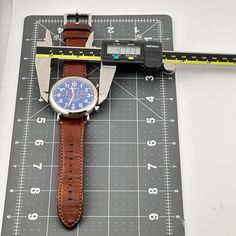 This  Shinola Chronograph watch is a beautiful timepiece that is built to last, and built right here in America.  Features: - Stainless steel 47mm case - Aniline latigo brown leather strap with minimal usage - Tang closure - Blue dial - Black and orange hands - Saphire Crystal - Luminescent hands - A lightning bolt is stamped on the back of each watch, representing Shinola's commitment to quality - Argonite 5021 quartz chronograph movement - Water resistant at 50 meters - Built in the US with Swiss and imported parts In excellent used condition, including box. Ships immediately! Chronograph Watch With Subdials For Everyday, Everyday Chronograph Watch With Subdials, Everyday Use Chronograph Watch With Subdials, Everyday Chronograph Watch With Analog Display, Chronograph Watch With Tachymeter For Everyday Use, Blue Analog Display Watch For Everyday Use, Blue Tachymeter Watch Accessories With Round Dial, Blue Analog Watch For Everyday Use, Shinola Womens Watch