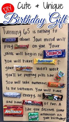 a paper sign with candy bars on it