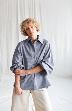 "We believe in handmade! Every piece is dedicated and made to the person who ordered it by using old traditional skills. About the shirt: Made in a beautiful soft brushed plaid cotton. Comfortable fit, elegant and feminine look. Versatile style - perfect for special occasion or to wear every day with your favorite pair of trousers, high-waisted jeans, skirt, or shorts.  *  Handmade in our studio *  Oversized  *  Long voluminous sleeves with elasticated cuff *  Pointed shirt collar *  Buttons clo Voluminous Sleeves, Jeans Skirt, Feminine Look, Brushed Cotton, Versatile Style, Shirt Collar, Oversized Shirt, High Waist Jeans, Womens Clothing Tops