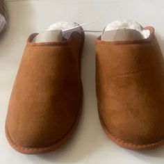 Family Cozy Slippers In Chestnut. Could Be Unisex Comfy Brown Slippers For Fall, Casual Brown Winter Slippers, Brown Indoor Slippers For Winter, Comfy Brown Winter Slippers, Comfortable Non-slip Brown Slippers, Brown Synthetic Slippers With Cork-bed Midsoles, Brown Winter Slip-on Slippers, Brown Slip-on Slippers With Textured Sole, Brown Plush Lined Indoor Slippers