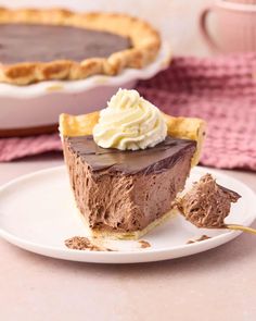 a slice of chocolate pie with whipped cream on top