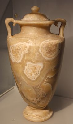 a large vase sitting on top of a table