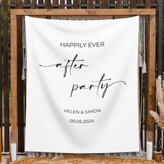 a white banner with the words happily ever after party written on it in black ink