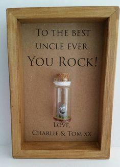 a small glass bottle with a message in it that says to the best uncle ever you rock