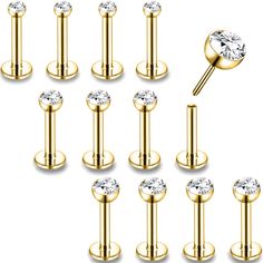 six pairs of gold plated stainless steel barbells with clear crystal stone center