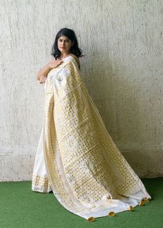 This light and airy Applique Saree is the perfect summer accessory for any wardrobe. Made of chanderi cotton silk with tissue fabric used for applique. These are made by our artisans from Barmer, India, it features exquisite hand-stitched and applique detailing, making it a stylish yet timeless piece. Perfect for a summer wedding or a party ! About Applique work~  A beautiful technique of patchwork a fabric on the base fabric. This one is slightly different from others as it used cutwork techniq White Cotton Silk Pre-draped Saree For Festivals, Traditional Off White Chanderi Pre-draped Saree, Festive Cotton Pre-draped Saree With Block Print, White Handloom Pre-draped Saree, Cream Art Silk Saree, White Cotton Silk Handloom Pre-draped Saree, Bohemian Chanderi Dupatta In Off White, Designer Chikankari Embroidered Off-white Saree, Bohemian Off White Chanderi Dupatta