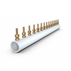 an assortment of brass and white screws on top of a white tube with gold fittings